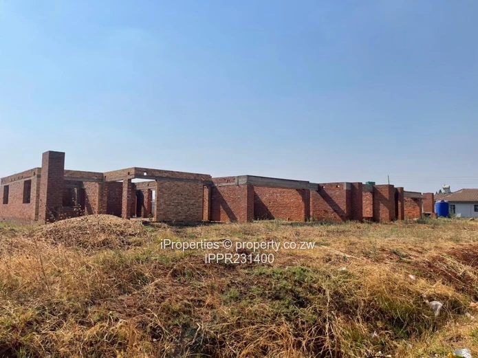 Spacious 2,000m² Corner Stand with Incomplete Multi-Unit Development