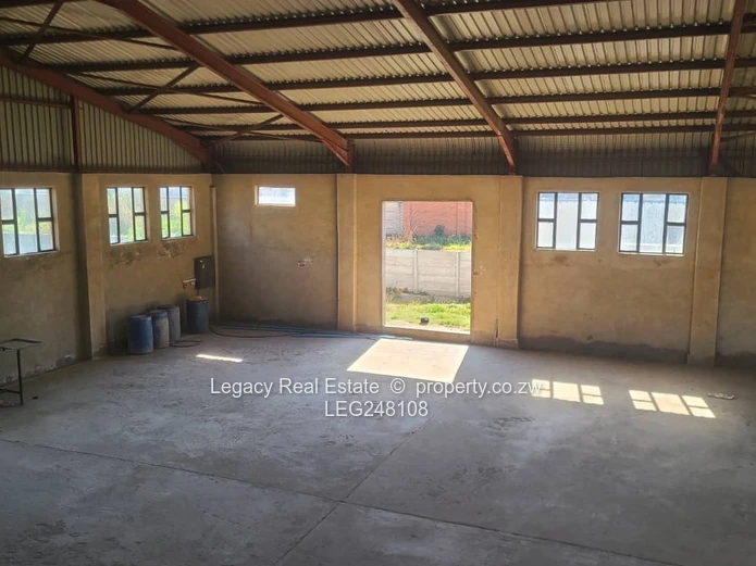 Commercial Warehouse With High Roof Clearance For Sale