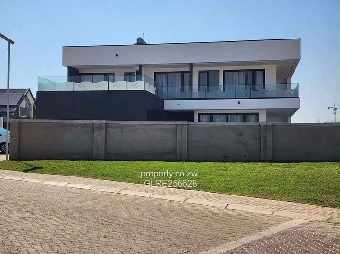 Borrowdale: Modern 4-Bed Apt w/ Glass Balconies & Borehole