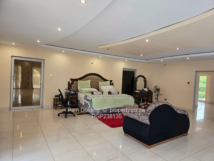 A grand palatial home- 8 bedrooms, 6 en-suite, Borehole, triple garages