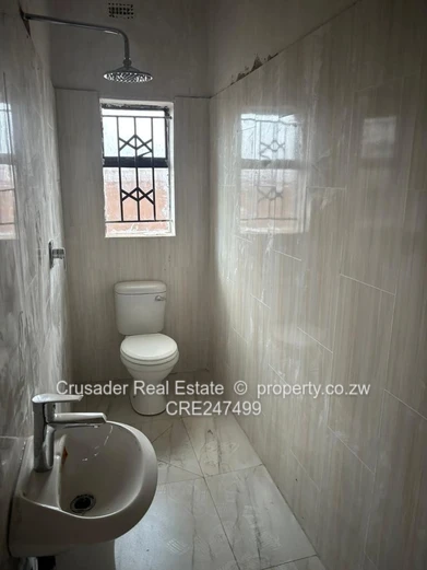 Modern 2-Bed Flat in Tynwald — Borehole & Built-ins (Sole Mandate)