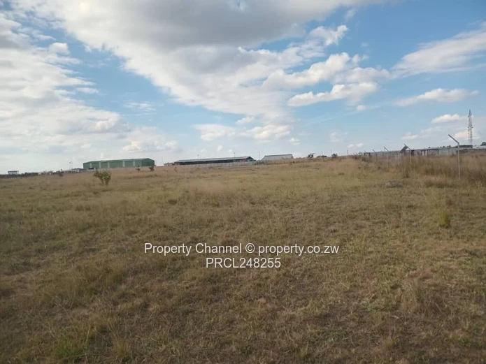 5,000 sqm Level Plot in 8km west of Gweru CBD — Open Grass, Adjacent Walled Property