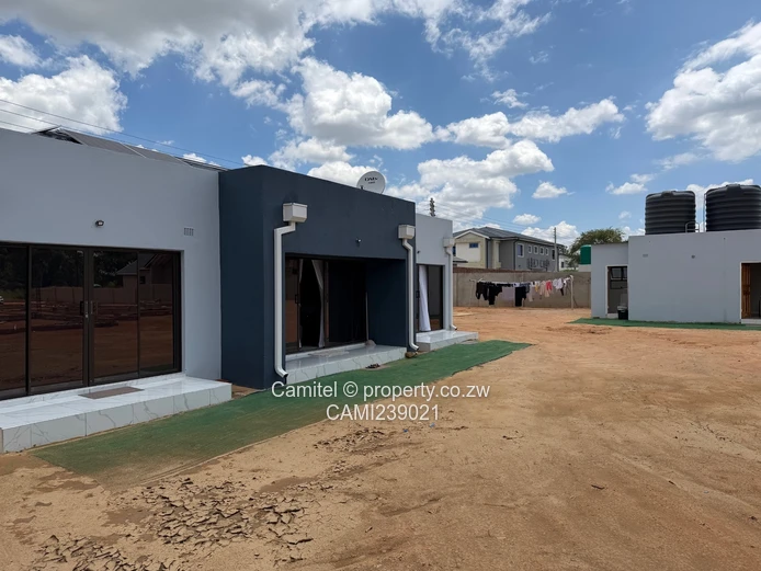 2100sqm Arlington stand with modern 2 bed cottage,gated community with clean title deed (Sole Mandate)