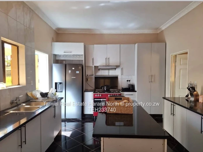 HOGERTY HILL CLUSTER FOR SALE   This 4 bed with a luxurious  MES with a walk-in closet features a