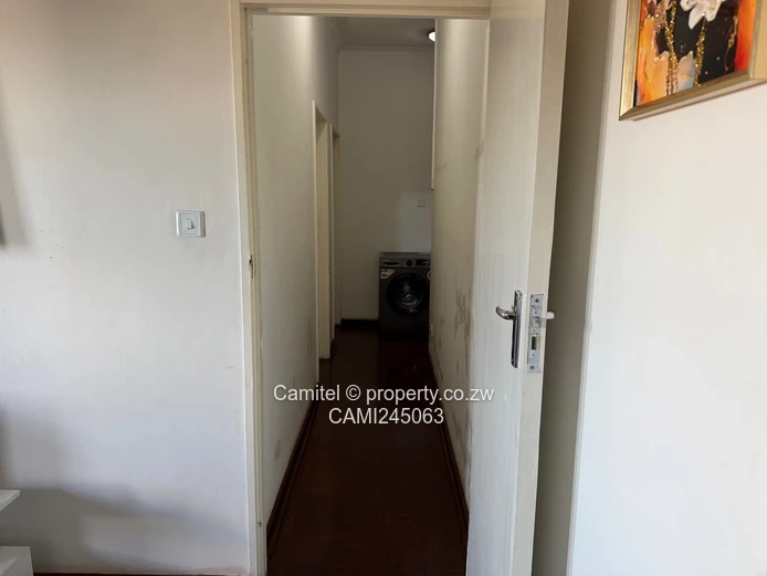 Chinamano Heights:Parquet-Floored 2-Bed Avenues Flat with Borehole (Sole Mandate)