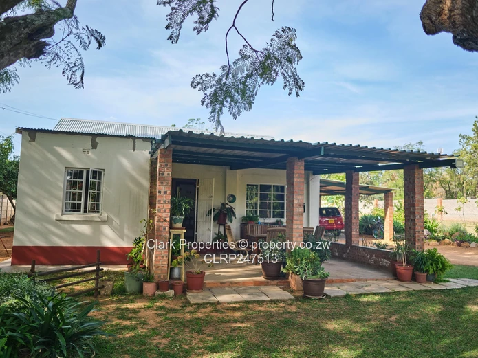 Charming Hillside Home with Undeveloped Land