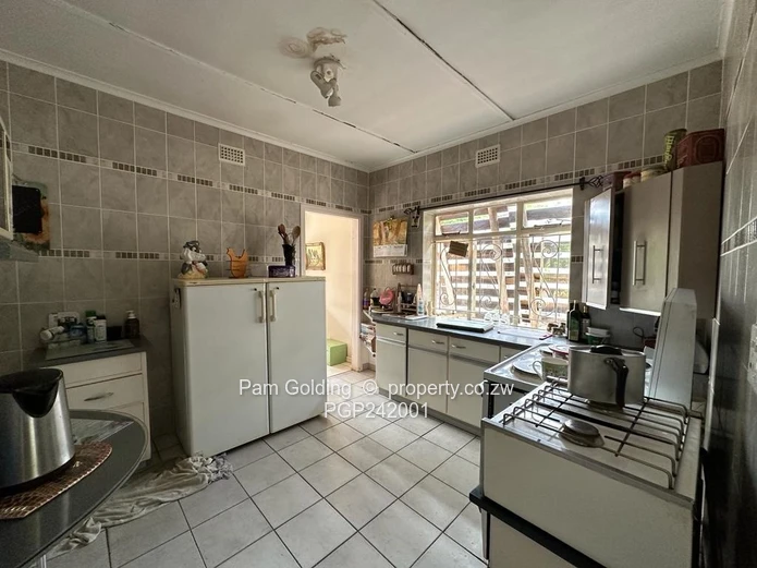 Charming, Compact Residence Set On Spacious Land