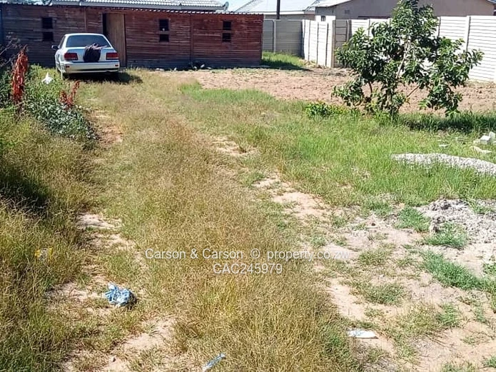 Secure Walled 450m² Stand with Gate on Gravel Road, Chitungwiza