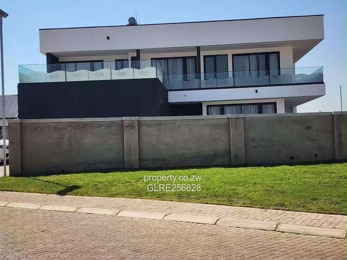 Borrowdale: Modern 4-Bed Apt w/ Glass Balconies & Borehole