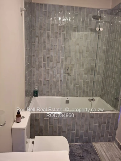 Chisipite 2-Bed Townhouse — Pool, Garden & Balcony