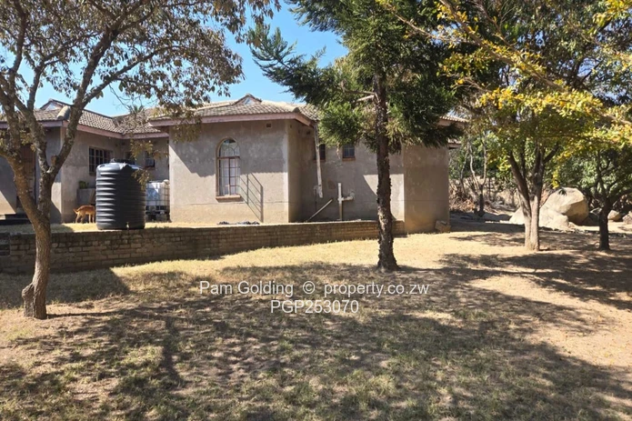 Incomplete 4-Bedroom House On An Acre