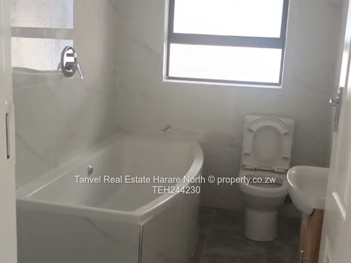 Strathaven:Available for Letting is a morden  3 bedroomed house with Mes, open plan kitchen, lounge 