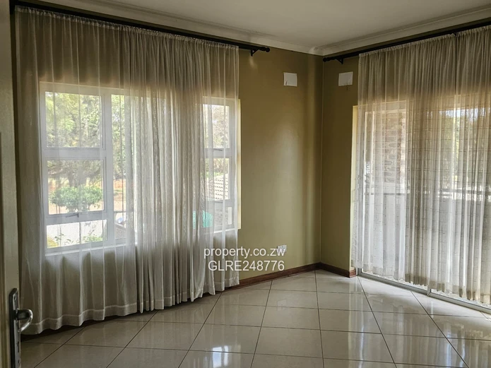 3BR Greendale Flat with Built-in Wardrobes, Borehole & Parking