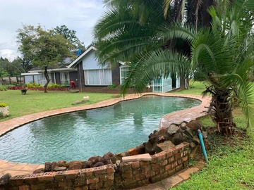 Elegant 3-Bed Oasis with Pool in The Grange, Harare