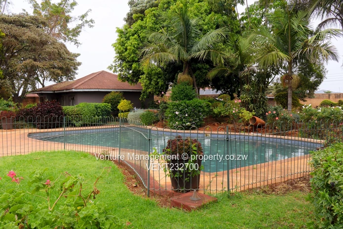 Immaculate 6 Bedroom Mansion with Cottage, Pool & Solar!