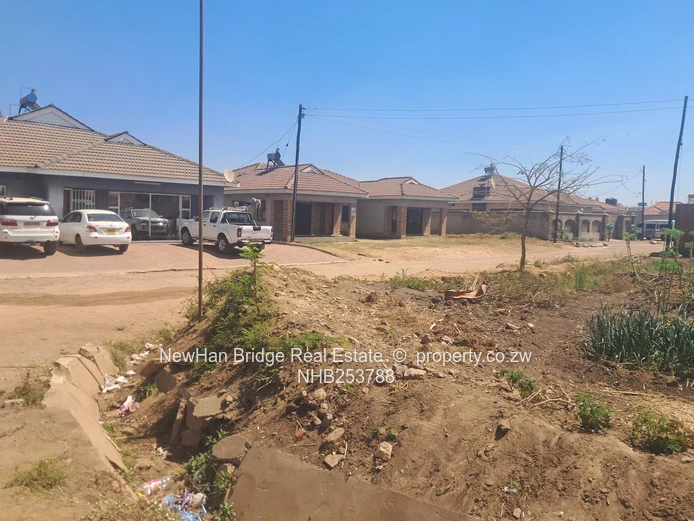 Sunlit 712m² Main-Road Corner Stand in Waterfalls — Tarred & Mains (Sole Mandate)