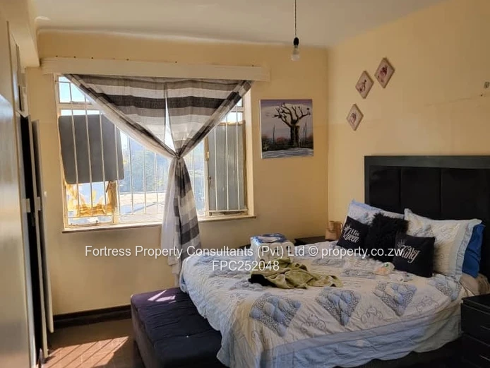 Sunlit 2-Bed Flat in Avenues CBD — Borehole (Sole Mandate)