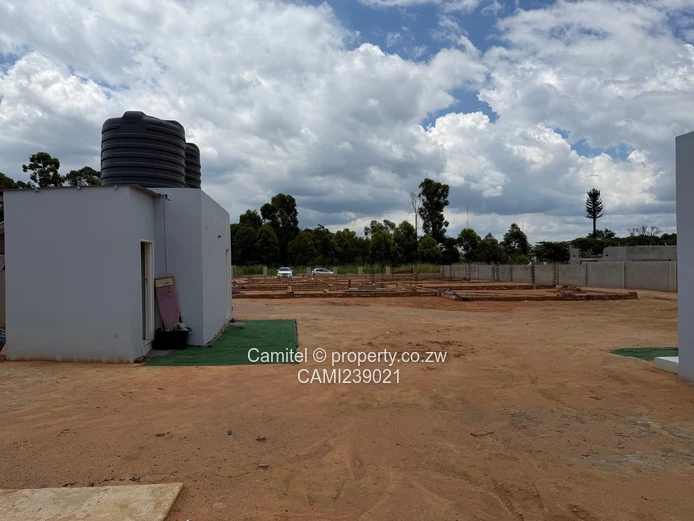 2100sqm Arlington stand with modern 2 bed cottage,gated community with clean title deed (Sole Mandate)