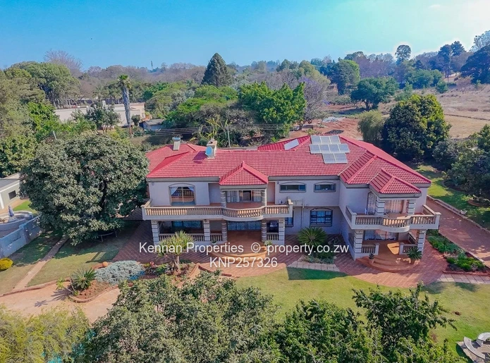  Charming 7 Bedroom Double Storey Home with a 5 Bedroom Cottage on 1 Acre