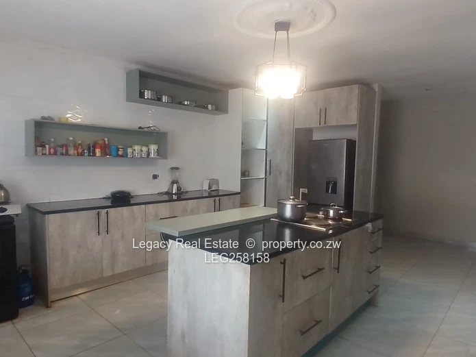 Spacious 4-Bed Home with Island Kitchen & Borehole