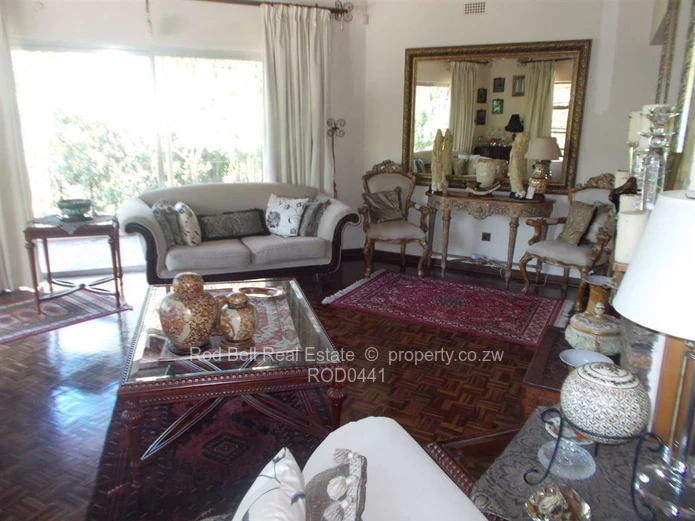 This property offers 2 homes and is set amongst stunning msasa trees