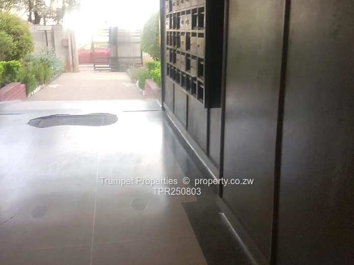 Avenues 2-Bed Flat: Tiled Lobby & Gated Entry