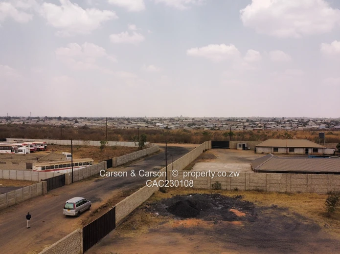 Walled 2568m² Stand on Gravel Road — Chitungwiza (Sole Mandate)