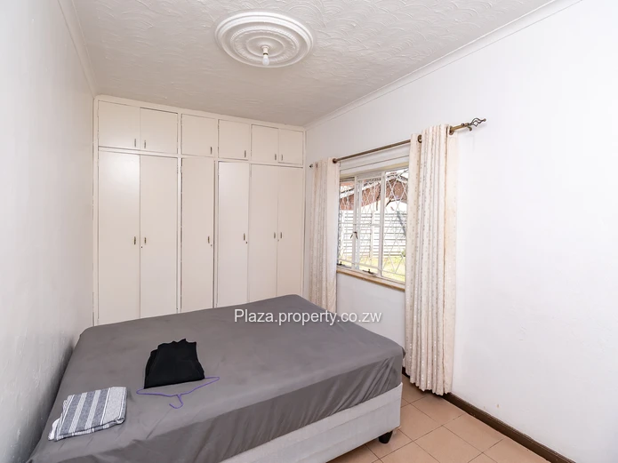 Strategically Located 4-Bedroom Family Home with Cottage – Sunridge, Harare Drive Frontage