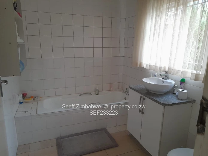 Avondale West Gem: Spacious Family Living with Cottage and Abundant Water Supply!