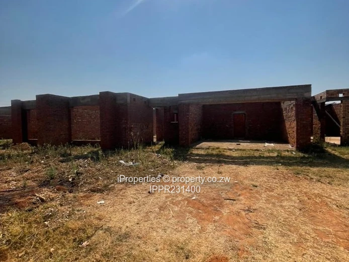 Spacious 2,000m² Corner Stand with Incomplete Multi-Unit Development