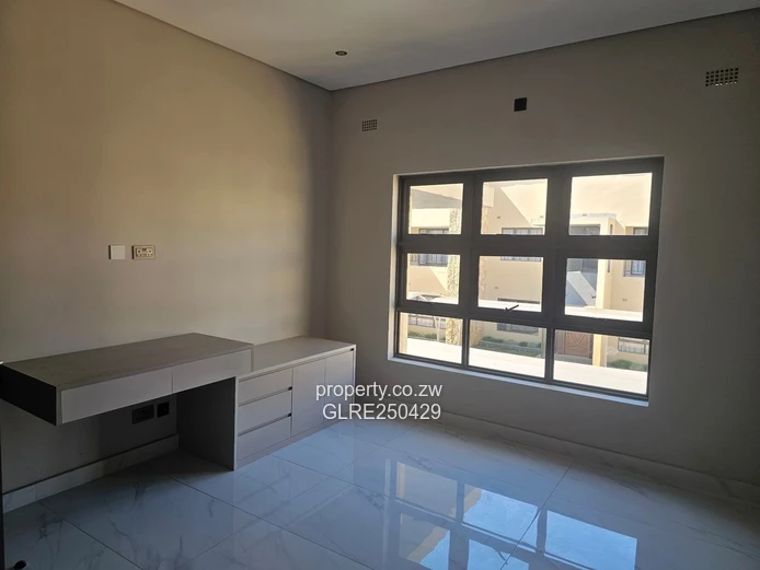 Stylish 3-Bed, 3-Bath Ashbrittle Home with Borehole