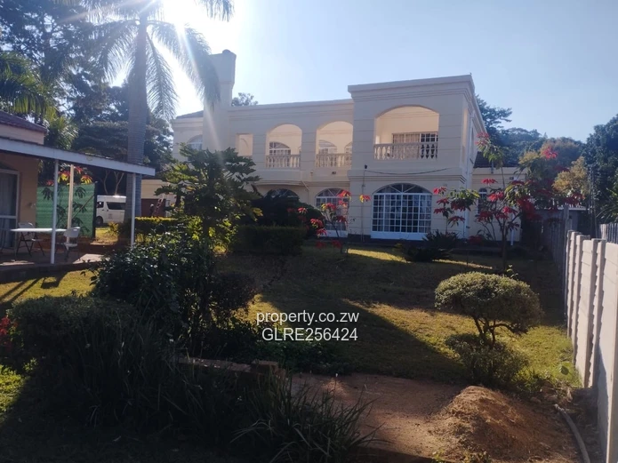 Palm-lined Borrowdale 5-Bed Home, 1,200m² & Borehole