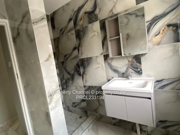 Modern 1-Bed Flat in Pomona, Harare North — Borehole