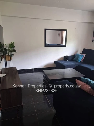 Secure 2-bedroom flat close to Avenues Hospital and Shops.