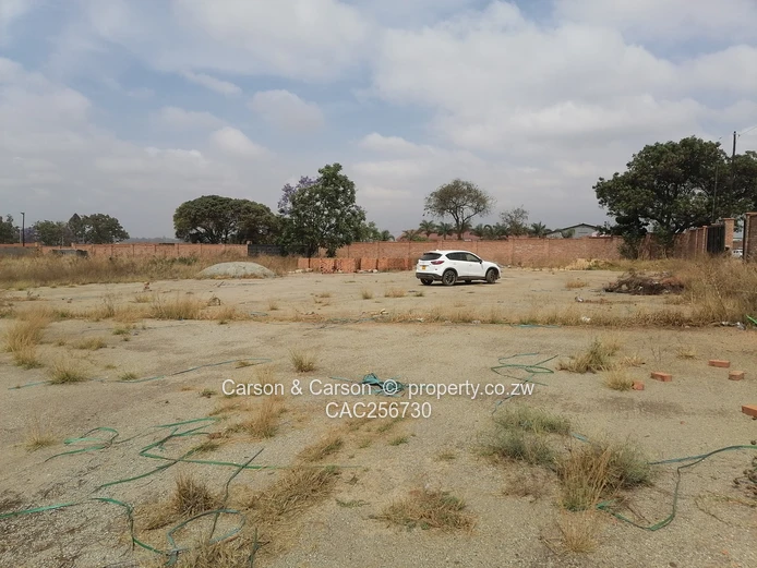 8001m² Walled Commercial Land — Main Road, Ardbennie, Harare South