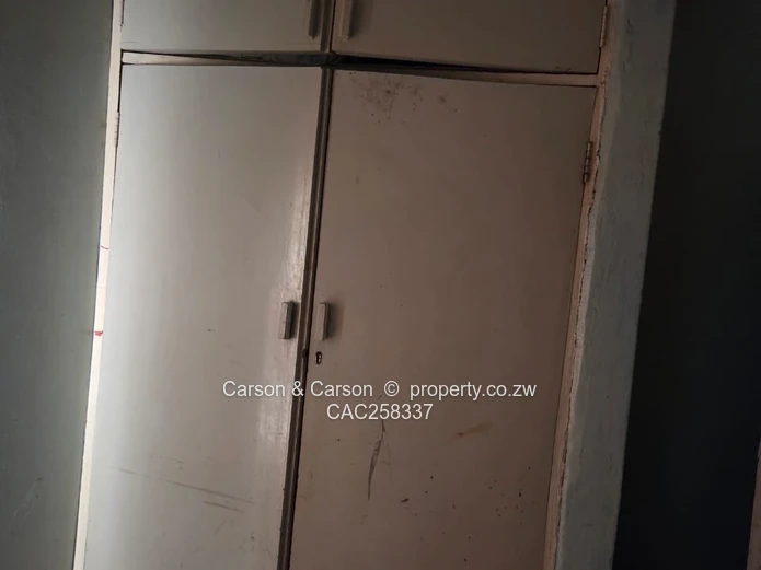 Mufakose 2 bedroom flat lounge fitted kitchen combined toilet and bathroom on ground floor 