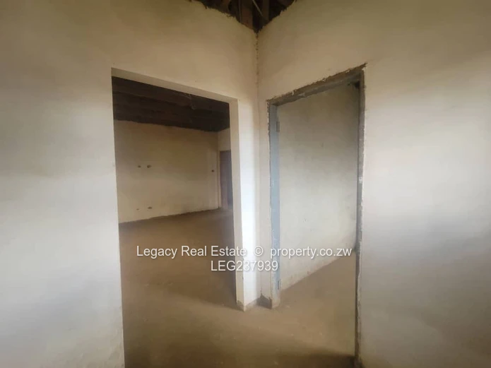 Prime Residential Plot with 4-Bedroom House to Complete