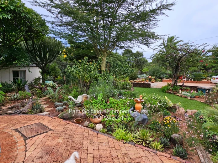 Charming, Compact Residence Set On Spacious Land