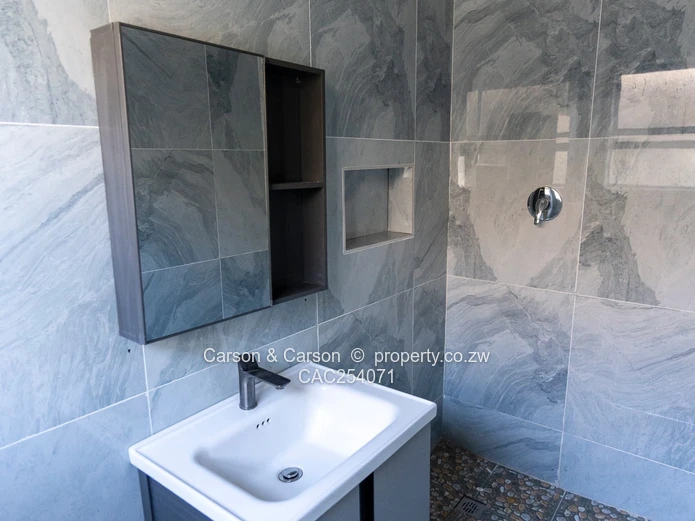 Modern 4-Bed Townhouse in Rainham — Grey & Red Accents, Pool
