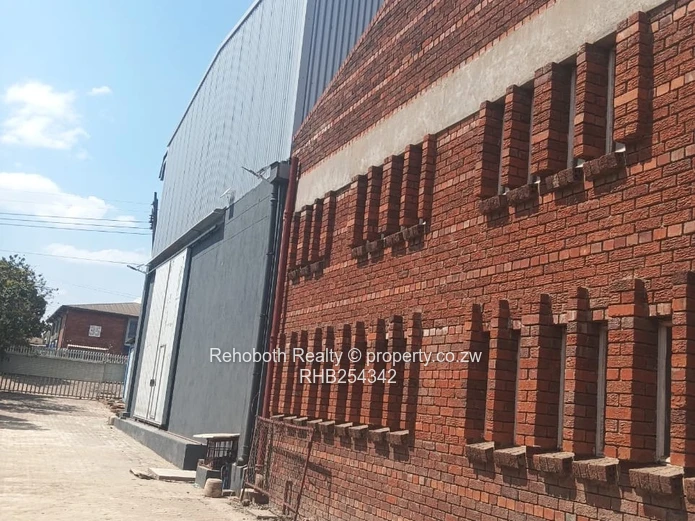 Graniteside Brick Warehouse 700m² on 3500m² — Borehole & Mezzanine