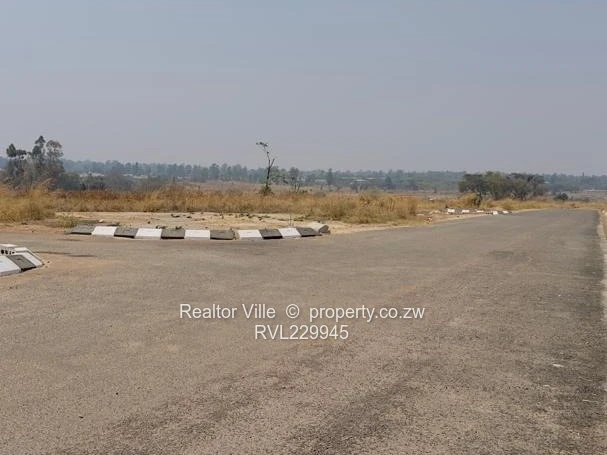 Prime 1,100m² Commercial Plot in Ruwa — Tarred Roads & Sewer