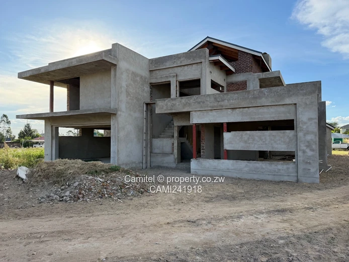 Incomplete 4 Bed double storey with a 3 bed cottage with title deed