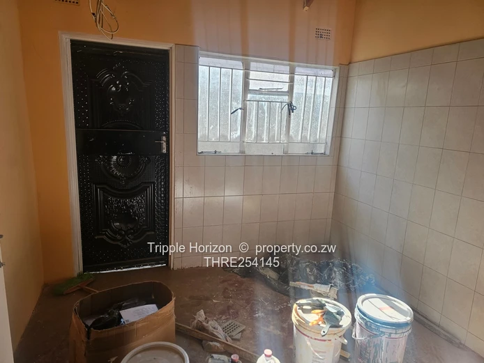 Chitungwiza unit O two houses for sale under one durawall 