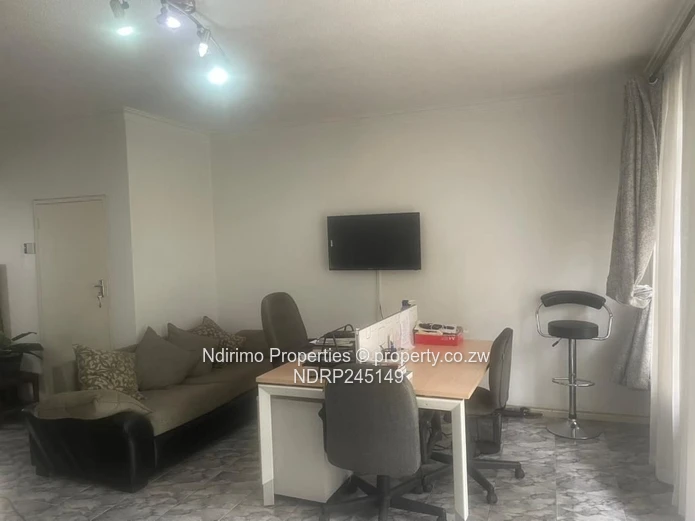 Secure 2-Bed Harare CBD Flat with Balcony, Garden & Modern Kitchen