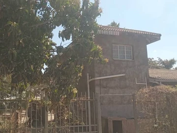 **Exceptional Double-Storey Commercial Gem in Chitungwiza!**