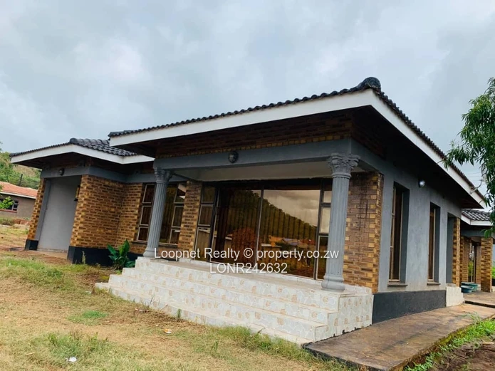 Brick-accented 3-Bed Concession Home with Borehole