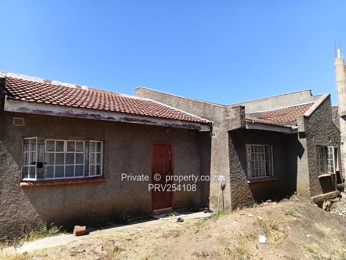 5-Bed Home with Brick Wall & Metal Gate in Pomona