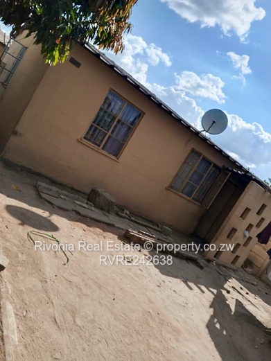 Modest 2-Bed Glen Norah Home with Satellite Dish