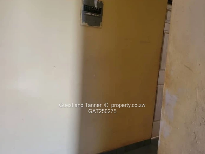 A neat 7-roomed, 4-bedroom house sitting on 200m², ideal for a family or as an investment property.