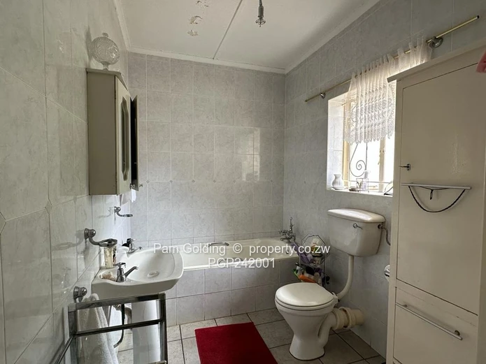 Charming, Compact Residence Set On Spacious Land